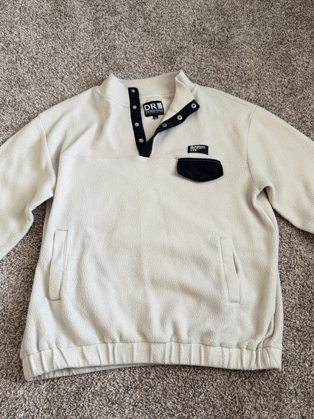 Essentials Men’s Cream Fleece Snap-Placket Pullover with Black Trim